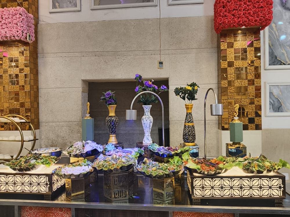 Dessert station with floral vases